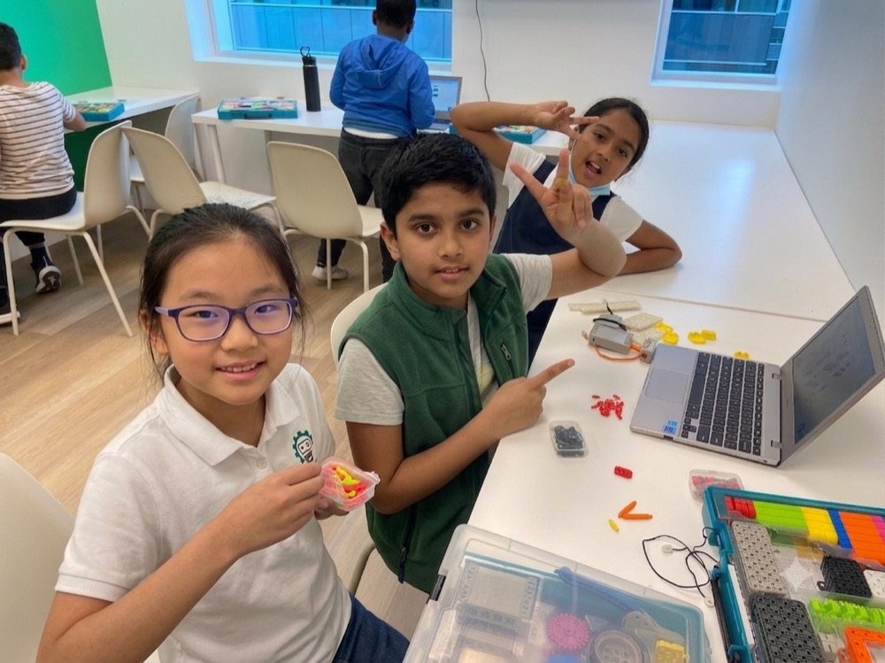STEMA students learning robotics
